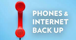Image of a phone with text: phones & internet are back up