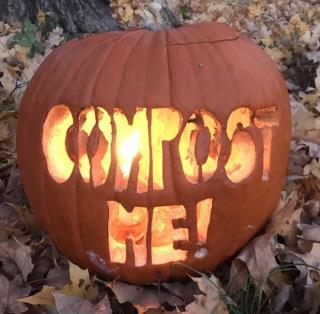 Carved Pumpkin that says "Compost Me"