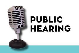 Image of a microphone with the words "public hearing" beside it
