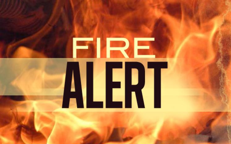 Picture of a fire with the text "fire alert"