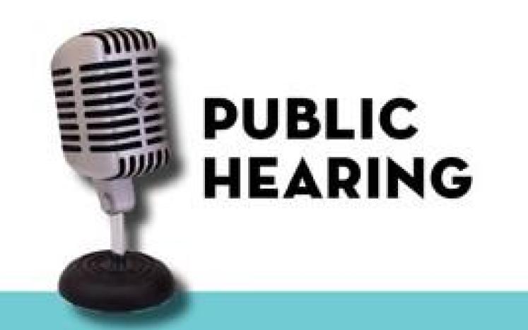 Image of a microphone and text: public hearing